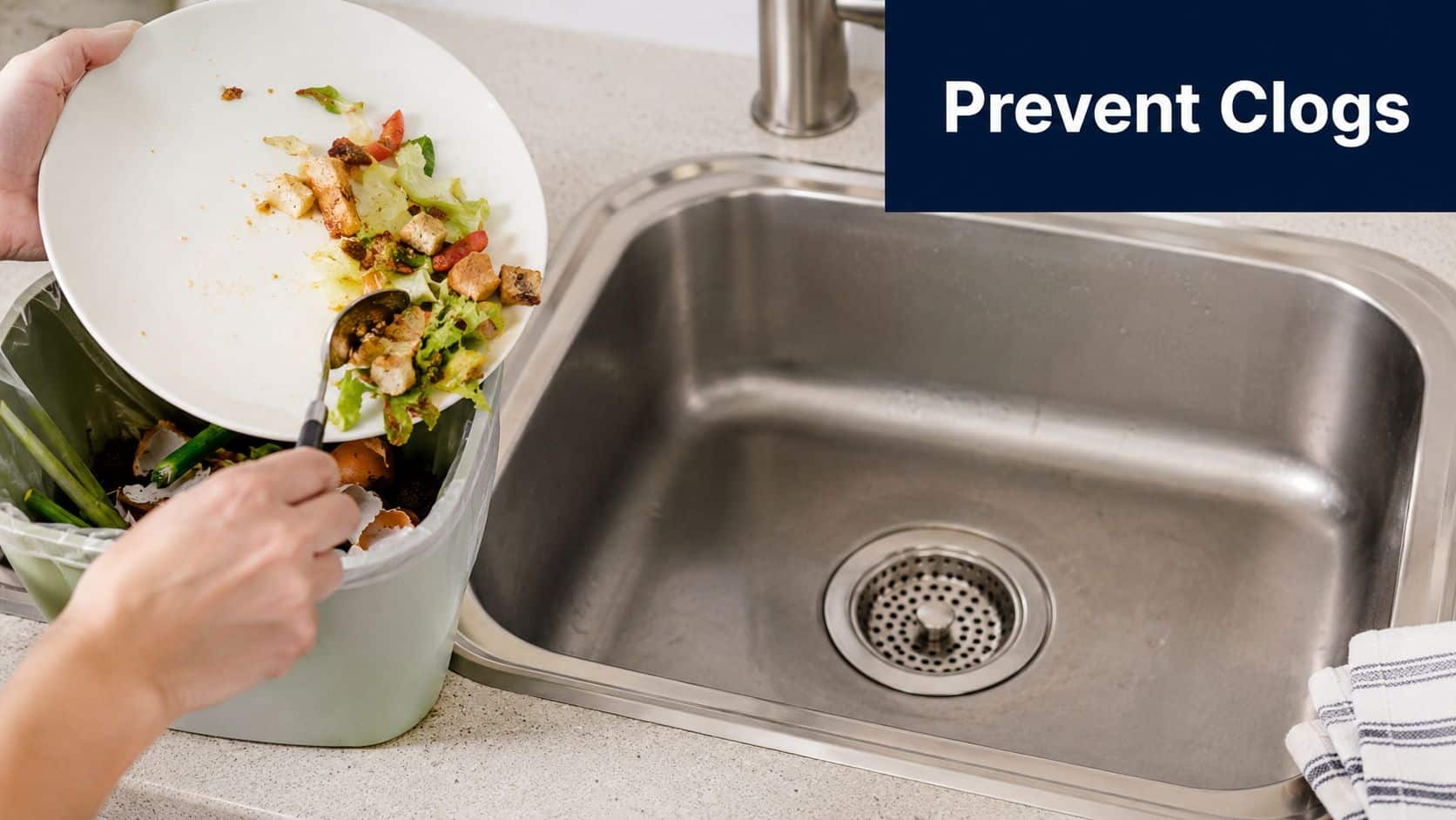 A person scraping leftover food from a plate into a trash bin to prevent kitchen sink clogs.